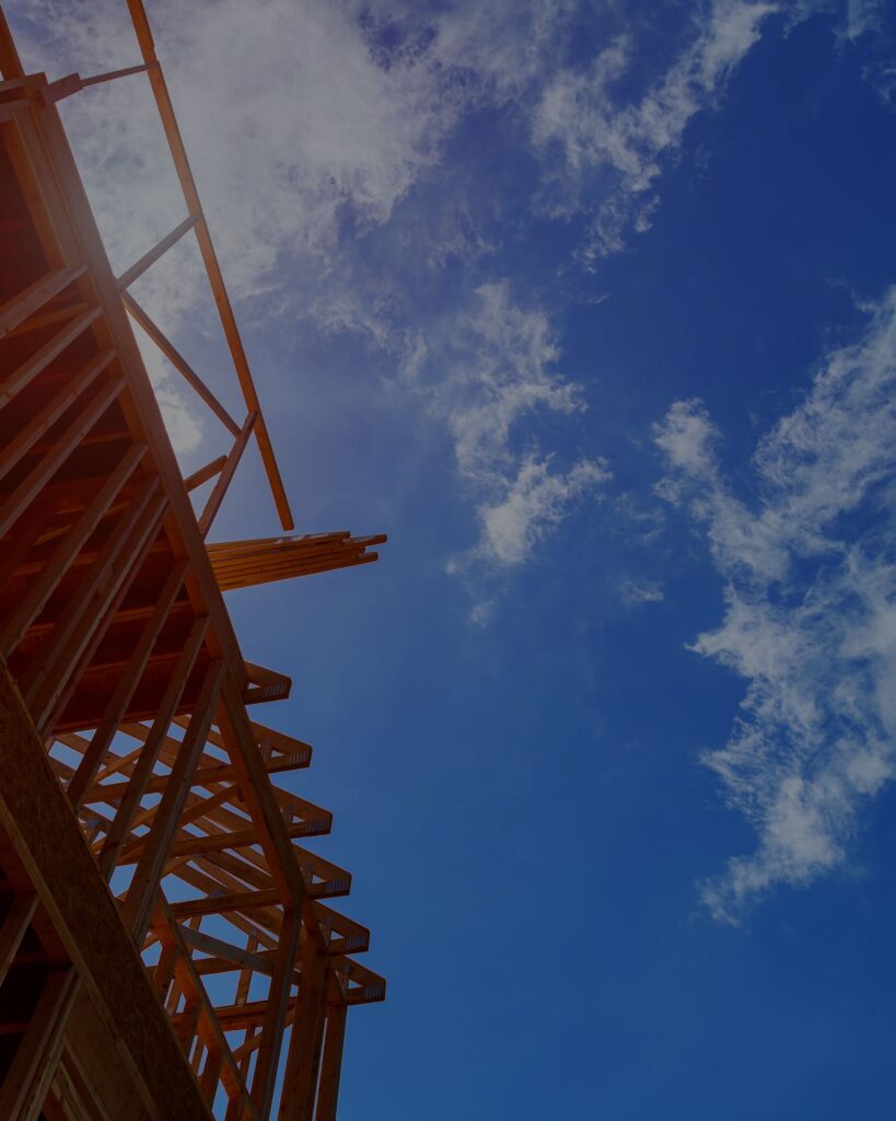 Featured image with a construction site up against a blue sky background