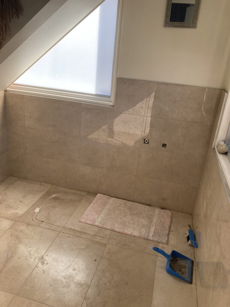 Mid-renovation update of the cupboard with the bathtub and dryer removed. Now it’s ready for joinery.