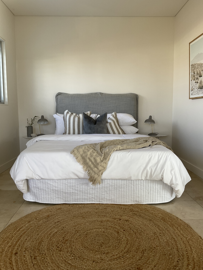 Bed with side tables and lamps in bedroom 5