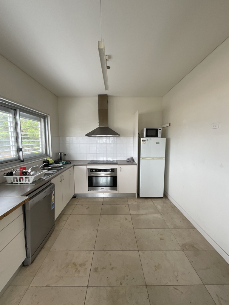 Before image of the bedroom renovation. The space used to be a kitchen for the studio space.