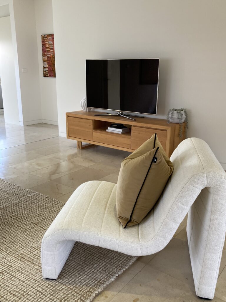 Armchair and entertainment unit in the living room