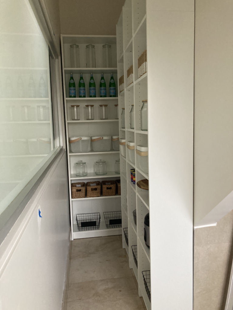 Image of shelves providing lots of storage in the pantry.