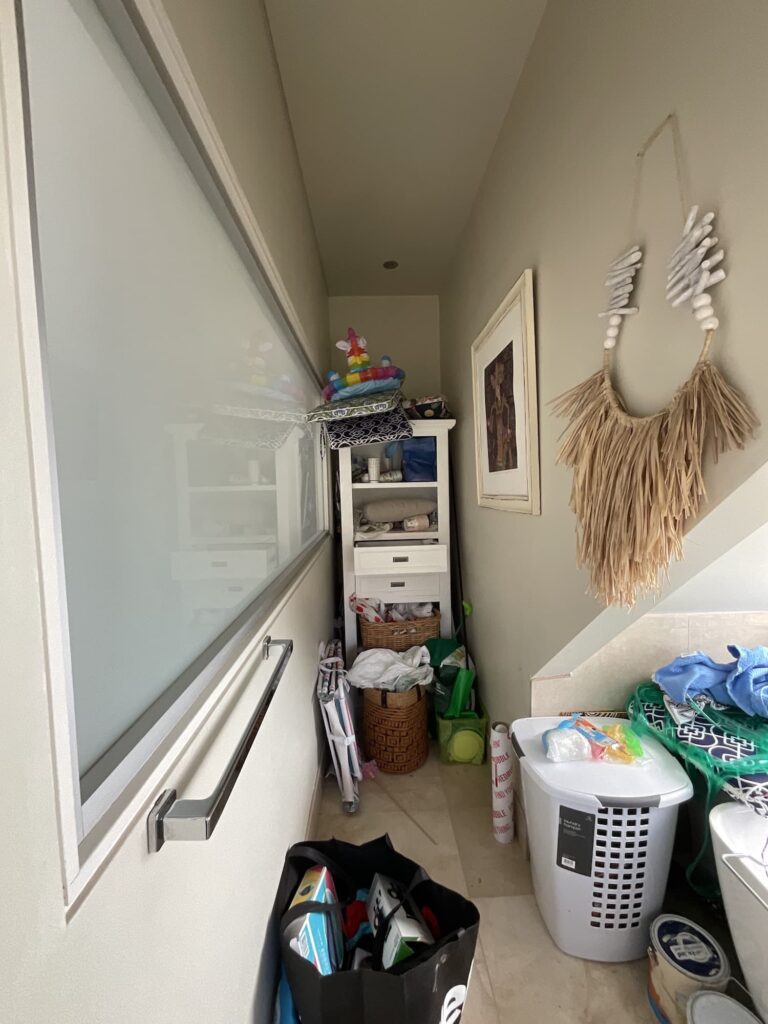 This awkward space was used for storage but was unorganised. We renovated the space to add a walk in pantry, a desirable feature for buyers