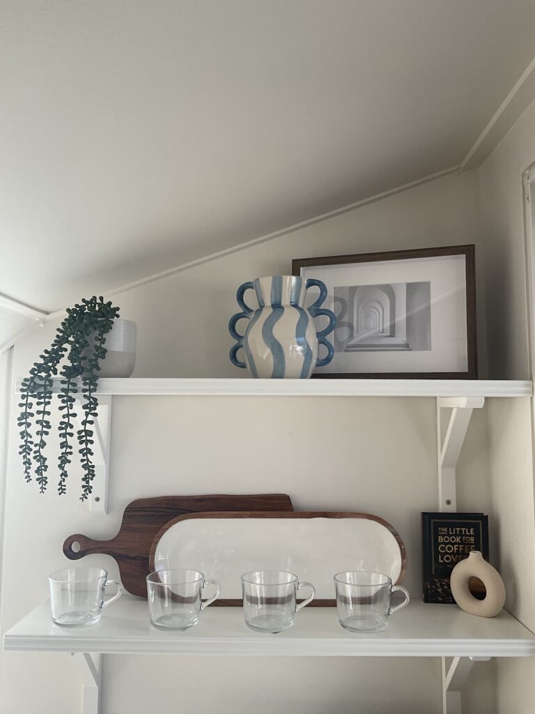 We used open shelves for more storage in the pantry renovation