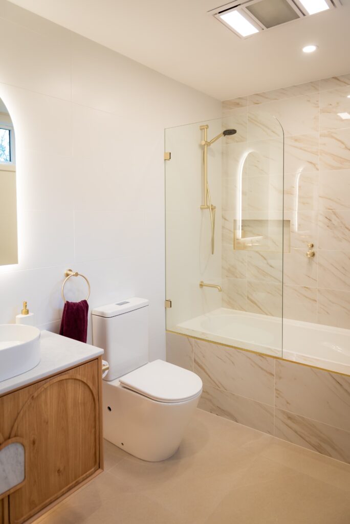 After image of Bathroom 1. The renovation updated the condition which added $1 million to the home's value