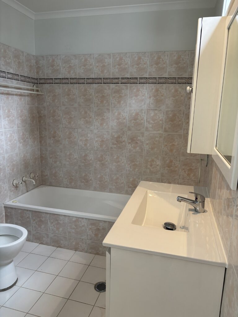 Before image of bathroom 1 which was dated and pokey
